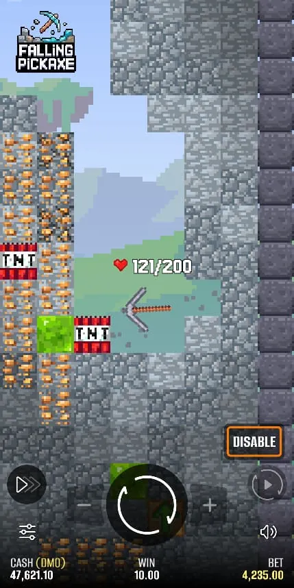 Two TNT blocks and a green slime block at the start of a Falling Pickaxe round, iron pickaxe at 121 of 200 durability